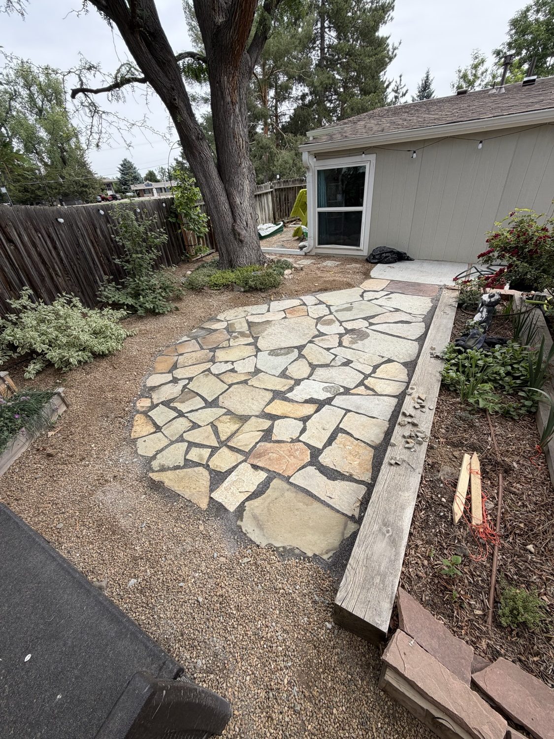 Natural flagstone patio under construction