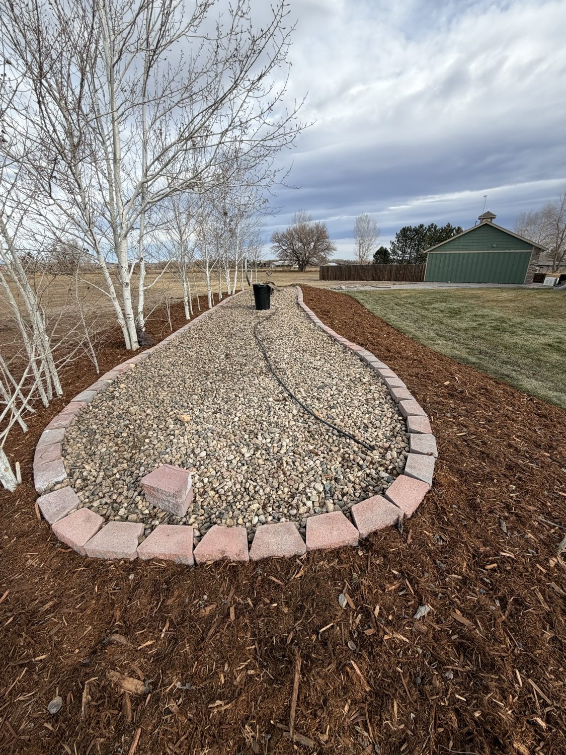 CJ Landscaping circular paver patio